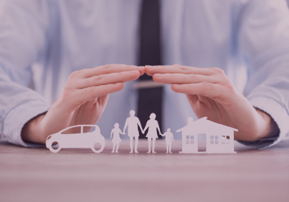 Image of hands providing cover to a family and their home