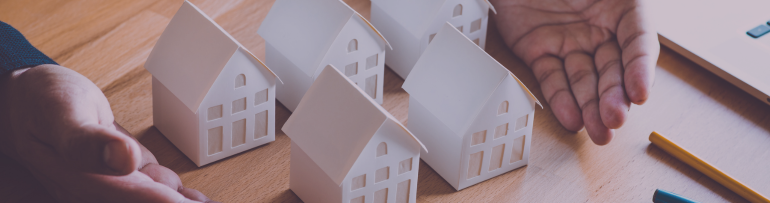 Image of model houses being collected
