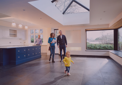 Image of parents and child having a viewing hosted by estate agent